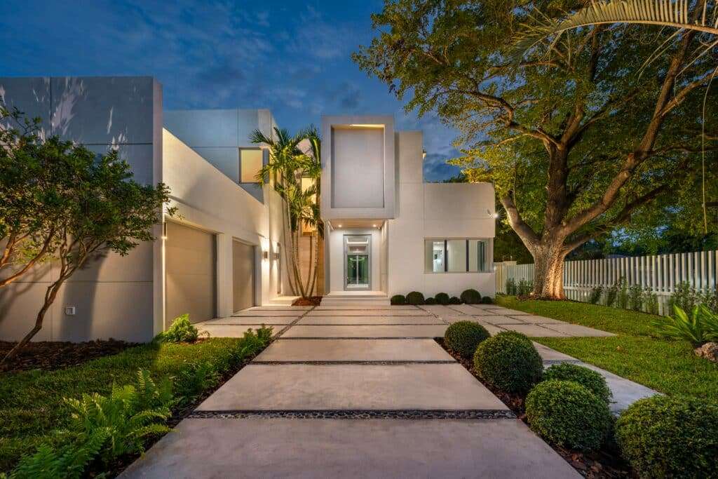 Modern luxury custom home with contemporary architecture, clean lines, premium landscaping, and upscale residential design.