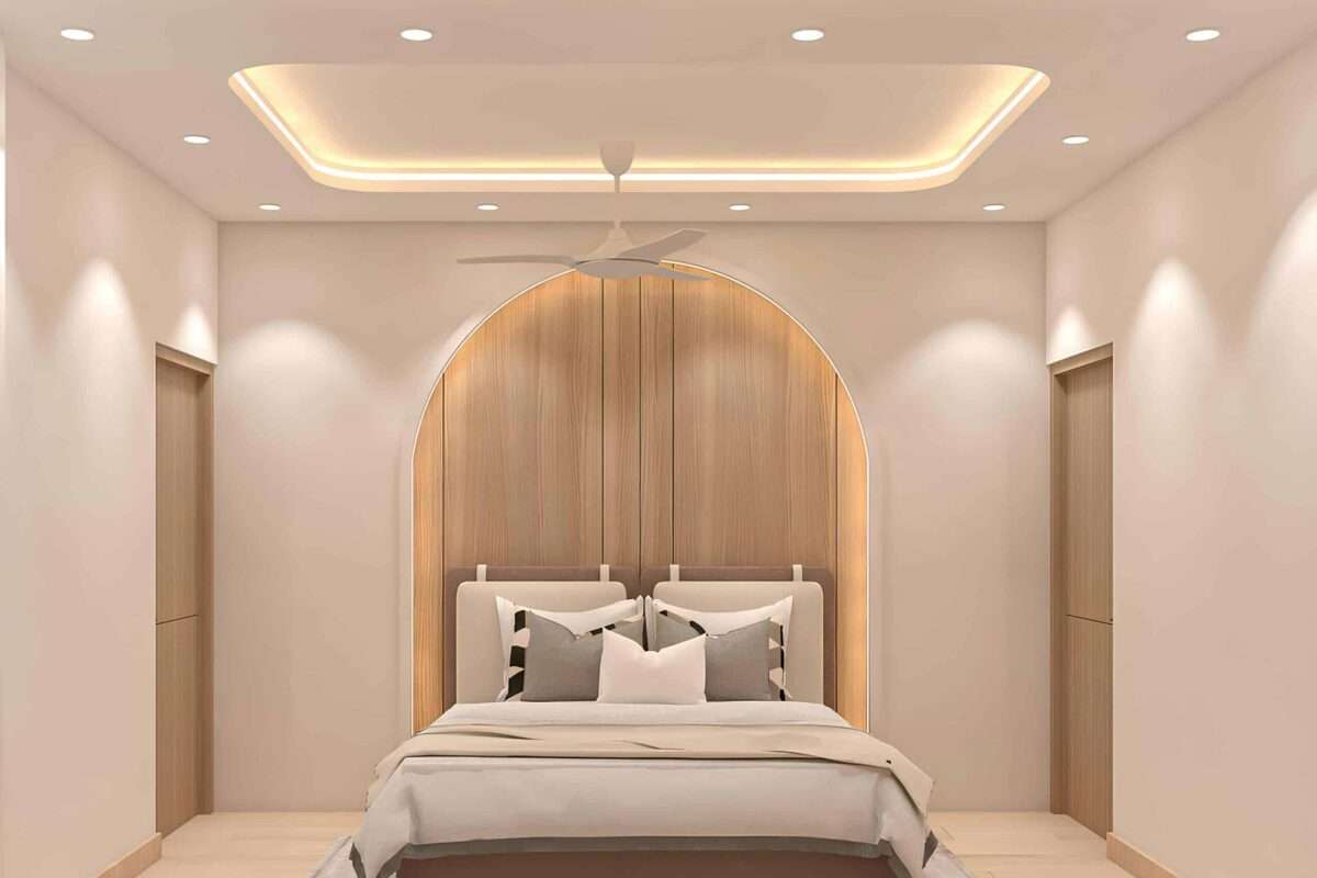 Luxury bedroom featuring smooth real plaster walls, warm wood accents, recessed lighting, and a custom illuminated arched headboard in a modern custom home.