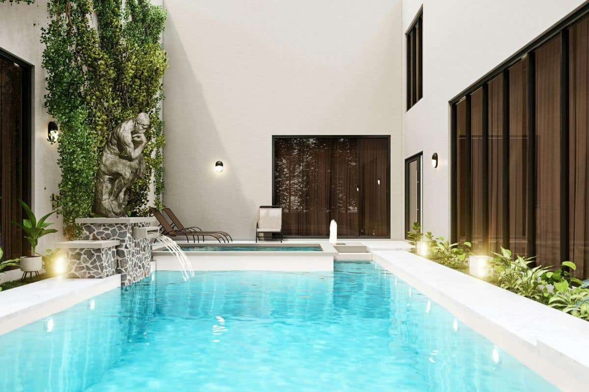 Luxury swimming pool surrounded by modern residential architecture