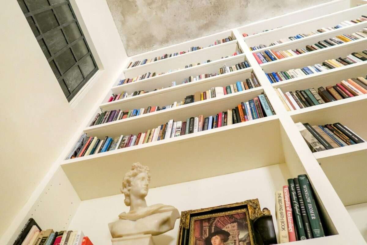 Luxury Home Library with Floor to Ceiling Custom Bookshelves